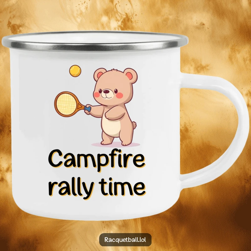 Funny camping mug showing a small bear humorously attempting to hit a bouncing ball upwards with an oversized tennis racquet, ready for outdoor fun.