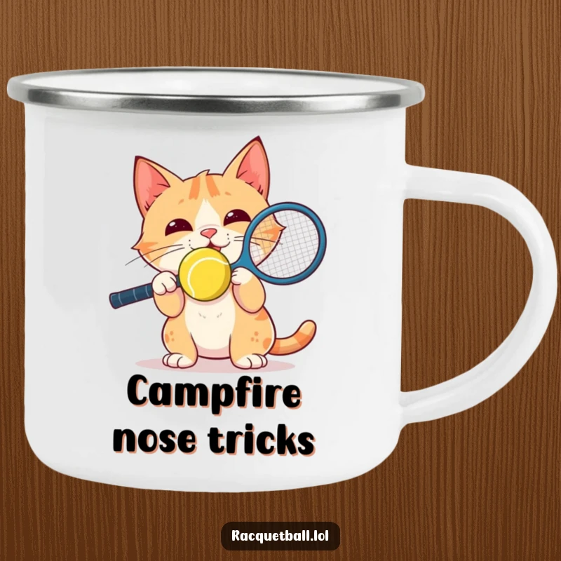 Funny Camping Mug: A delighted cat balances a yellow racquetball on its nose with intense focus, perfect for rugged adventures.