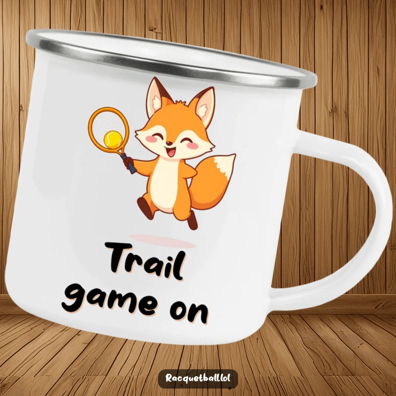 Funny Camping Mug: A cheerful fox leaps to hit a yellow racquetball with a tiny racquet, perfect for enjoying drinks outdoors.