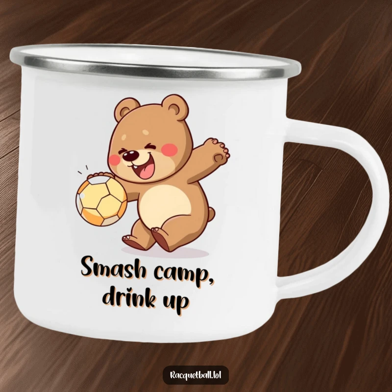 Funny camping mug showing a cheerful bear smashing a ball, robust for outdoor use and filled with energetic humor.