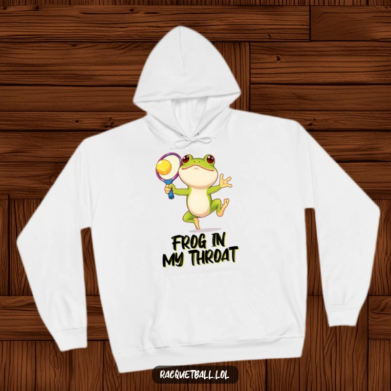 Funny frog tennis hoodie, a smiling amphibian leaping with an oversized, colorful racquet, bringing cozy vibes and playful energy.