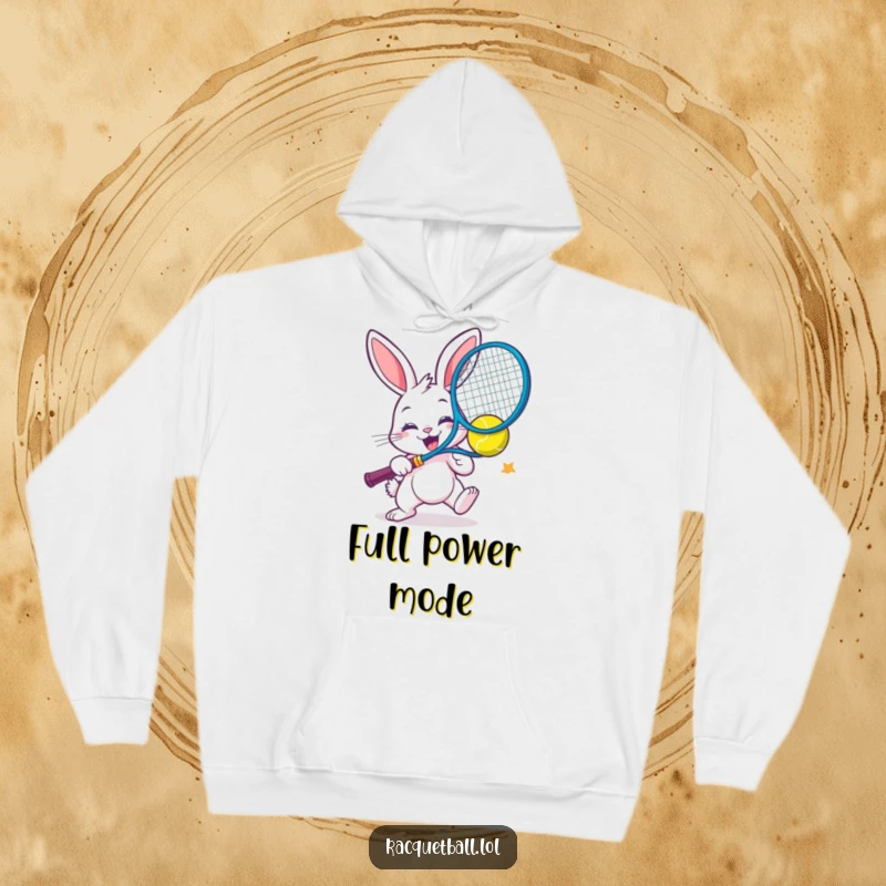 Funny, cozy hoodie featuring a cheerful bunny smashing a colorful racquetball with extreme enthusiasm.