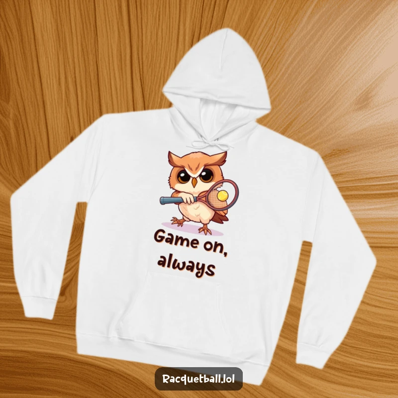 Funny owl tennis hoodie showcasing a focused owl swinging a tiny racquet, designed for comfort and a love of the game, a great sports funny gift.
