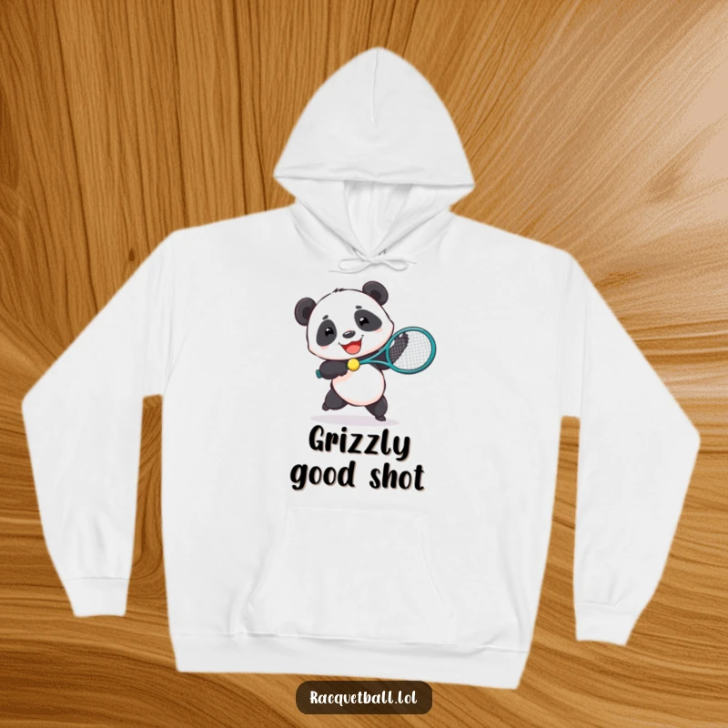 Funny hoodie design of a joyful panda playing tennis with a comically oversized racquet, symbolizing fun.