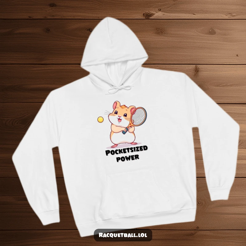 Funny kawaii hamster hoodie, a cute hamster enthusiastically playing racquetball, designed for cozy, happy vibes.