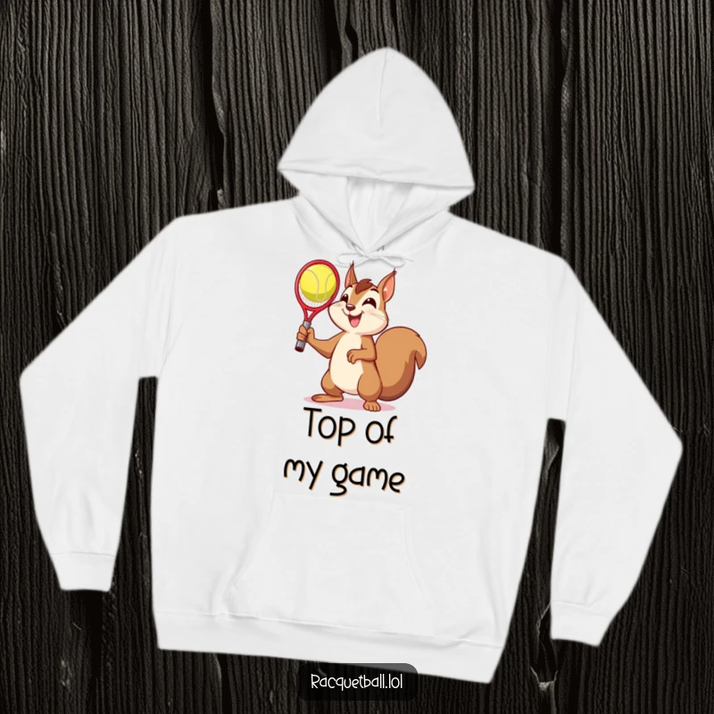 Funny hoodie with a squirrel in a jubilant victory pose after catching a racquetball, embodying humorous achievement and comfort.