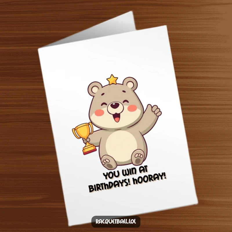 Funny Free Printable Birthday Card: A proud, smiling bear hoists a miniature trophy, celebrating a hard-won point.