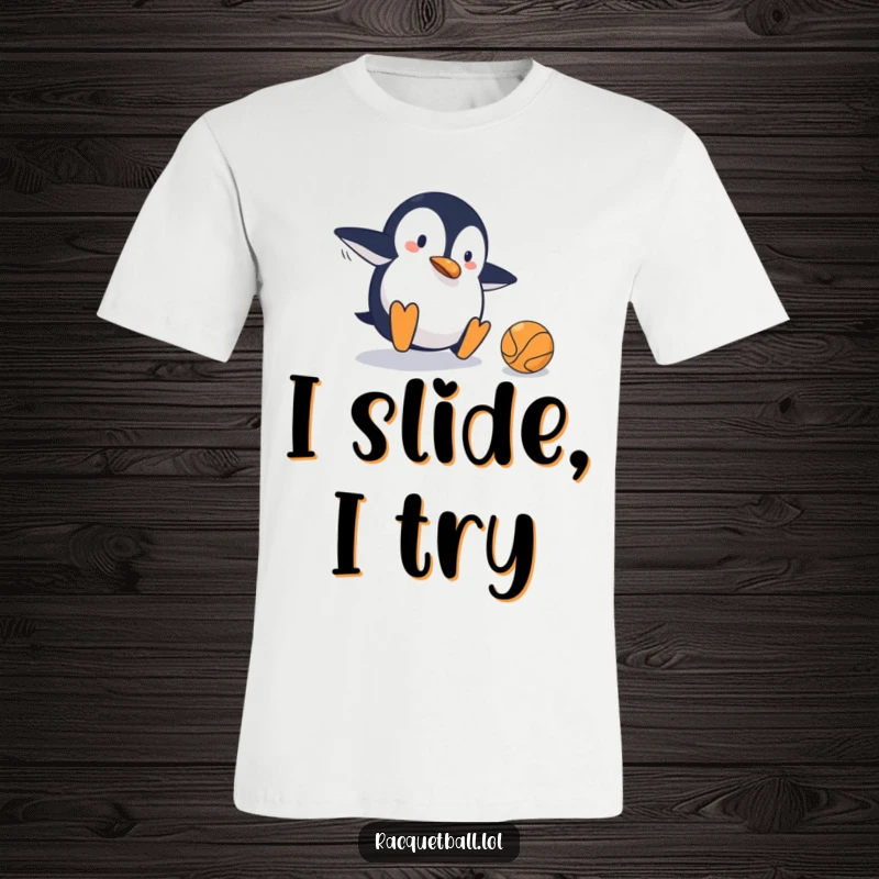 Funny t-shirt showing a clumsy penguin spectacularly sliding on a tennis court, narrowly missing the ball in a hilarious display of athletic mishap.