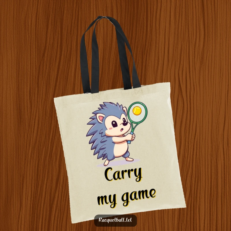 Determined hedgehog swinging a tennis racquet to hit a ball upwards, printed on a durable tote bag for sports gear.