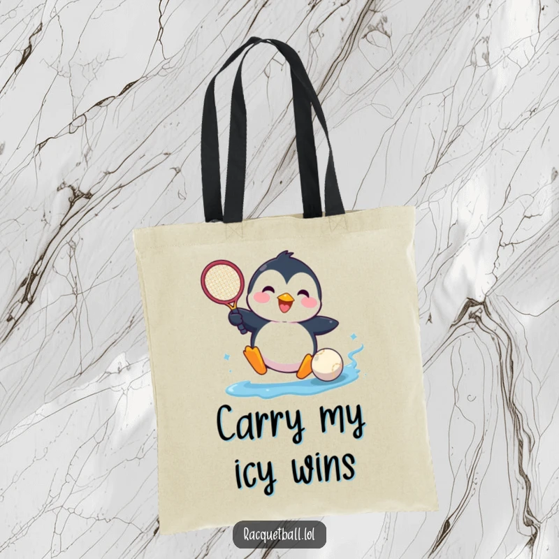 Funny tote bag featuring a happy penguin comically sliding into a tennis ball, perfect for shopping and daily errands.