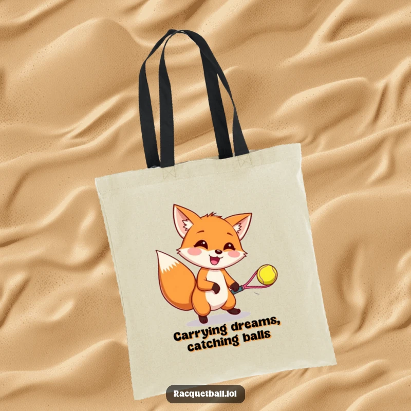 Funny tote bag with a cheerful fox mid-air, catching a bouncing racquetball, symbolizing energy and a love for fun sports.