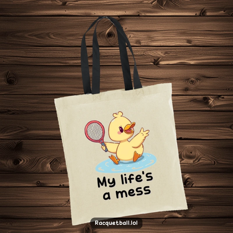 Funny duck tennis tote bag featuring a cute duck sliding dramatically with its tennis racquet outstretched to save.